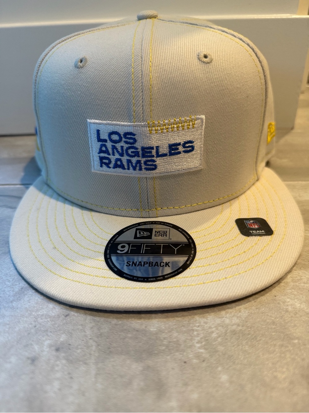 Unworn New Era Los Angeles Rams Cream and Blue Snapback Hat